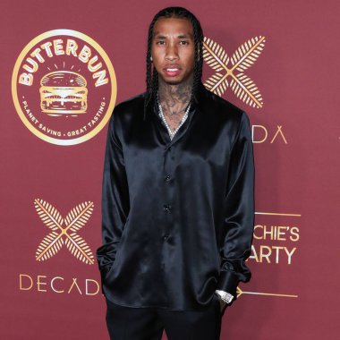 Rapçi Tyga (Micheal Ray Stevenson), 26 Mart 2022 tarihinde Bel Air, Los Angeles, Kaliforniya, ABD 'de düzenlenen Darren Dzienciol ve Richie Akiva Oscar Partisi 2022' ye geldi.. 