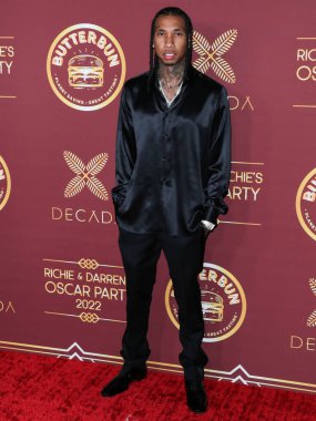 Rapçi Tyga (Micheal Ray Stevenson), 26 Mart 2022 tarihinde Bel Air, Los Angeles, Kaliforniya, ABD 'de düzenlenen Darren Dzienciol ve Richie Akiva Oscar Partisi 2022' ye geldi.. 