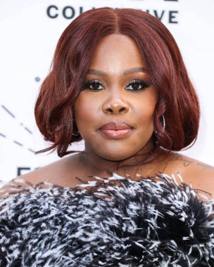 Amber Riley, 24 Mart 2022 'de Beverly Wilshire Four Seasons Oteli' nde düzenlenen 'Siyah Sinema Evreni' ni vurgulayan Hollywood Ödülleri 'nde Siyahi Kadınlar 15. Yıllık ESSENCE' ye geldi.