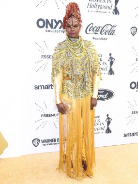 Caroline Wanga, 24 Mart 2022 'de Beverly Wilshire Four Seasons Oteli' nde düzenlenen 'Siyah Sinema Evreni' ni vurgulayan Hollywood Ödülleri 'nde Siyahi Kadınlar 15. Yıllık ESSENCE' ye geldi.