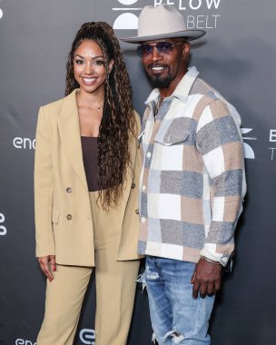 Amerikalı aktris Corinne Foxx ve baba / Amerikalı aktör Jamie Foxx, 1 Ekim 2022 'de Los Angeles, Kaliforniya, ABD' de bulunan Amerika Tiyatro Kompleksi Yönetmenler Birliği 'nin' Below the Belt 'in Los Angeles' taki ilk gösterimine geldiler.. 