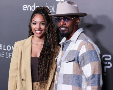 Amerikalı aktris Corinne Foxx ve baba / Amerikalı aktör Jamie Foxx, 1 Ekim 2022 'de Los Angeles, Kaliforniya, ABD' de bulunan Amerika Tiyatro Kompleksi Yönetmenler Birliği 'nin' Below the Belt 'in Los Angeles' taki ilk gösterimine geldiler.. 