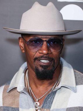 Amerikalı aktör Jamie Foxx, 1 Ekim 2022 'de ABD' nin Kaliforniya eyaletinin Los Angeles şehrinde bulunan Amerikan Tiyatro Kompleksi Yönetmenler Birliği 'nde düzenlenen' Below the Belt 'in Los Angeles Prömiyeri' ne geldi..
