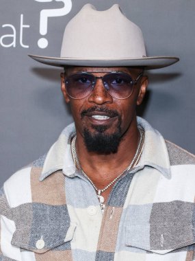 Amerikalı aktör Jamie Foxx, 1 Ekim 2022 'de ABD' nin Kaliforniya eyaletinin Los Angeles şehrinde bulunan Amerikan Tiyatro Kompleksi Yönetmenler Birliği 'nde düzenlenen' Below the Belt 'in Los Angeles Prömiyeri' ne geldi..