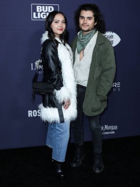 Amerikalı aktris Stella Hudgens ve erkek arkadaşı / Amerikalı aktör Eric Unger, 13 Şubat 2022 'de Hollywood Sunset Room Hollywood' da Lil Wayne 'in ev sahipliğinde düzenlenen TailGates Büyük Maç ve Sonrasında Parti' ye geldiler.