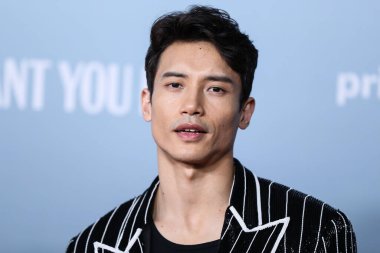 Filipinli aktör Manny Jacinto, 8 Şubat 2022 'de Los Angeles, Kaliforniya, ABD' de düzenlenen 