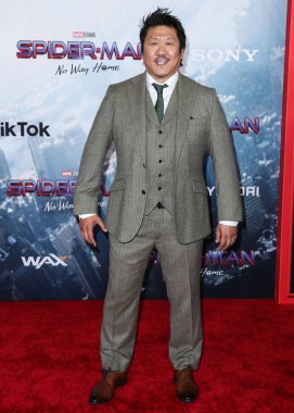 İngiliz aktör Benedict Wong, 13 Aralık 2021 'de Westwood, Los Angeles, Kaliforniya, ABD' deki Regency Village Theatre 'da düzenlenen Columbia Pictures' ın Örümcek Adam: No Way Home 'un Los Angeles galasına geldi..