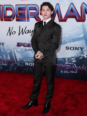 Aktör Tom Holland 13 Aralık 2021 'de Westwood, Los Angeles, Kaliforniya, ABD' deki Regency Village Theatre 'da düzenlenen' Örümcek Adam: No Way Home 'filminin Los Angeles prömiyerine geldi..