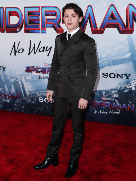 Actor Tom Holland arrives at the Los Angeles Premiere Of Columbia Pictures' 'Spider-Man: No Way Home' held at the Regency Village Theatre on December 13, 2021 in Westwood, Los Angeles, California, United States.