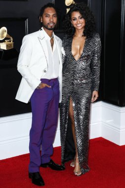 Amerikalı şarkıcı Miguel (Miguel Jontel Pimentel) ve eşi / Amerikalı aktris Nazanin Mandi (Nazanin Aliza Mandighomi Pimentel), 10 Şubat 2019 tarihinde ABD 'nin Los Angeles, Kaliforniya eyaletindeki Staples Center' da düzenlenen 61..