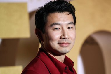 Kanadalı aktör Simu Liu, 11 Aralık 2021 'de Beverly Hilton Hotel' de düzenlenen 19. Unutulmaz Asya Amerikan Ödülleri 'ne geliyor..