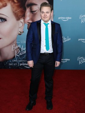 Composer Josh Bednarsky arrives at the Los Angeles Premiere Of Amazon Studios' 'Being The Ricardos' held at the Academy Museum of Motion Pictures on December 6, 2021 in Los Angeles, California, United States.  clipart