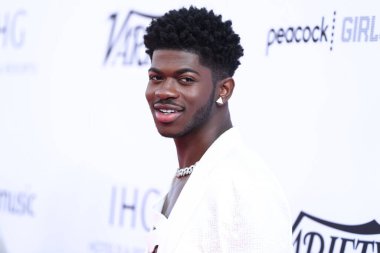 Balmain giyen rapçi Lil Nas X, Peacock ve Girls5eva tarafından sunulan ve 4 Aralık 2021 tarihinde Los Angeles, Kaliforniya, ABD 'deki City Market Social House' da düzenlenen IHG Otelleri ve Resorts sponsorluğundaki Music Hitmakers Brunch 'a geldi.