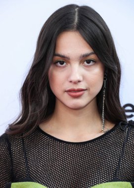 Calvin Luo 'yu giyen şarkıcı Olivia Rodrigo, Peacock ve Girls5eva tarafından sunulan ve 4 Aralık 2021' de Los Angeles, Kaliforniya 'daki City Market Social House' da düzenlenen IHG Otelleri ve Resorts sponsorluğundaki Music Hitmakers Brunch 'a geldi.