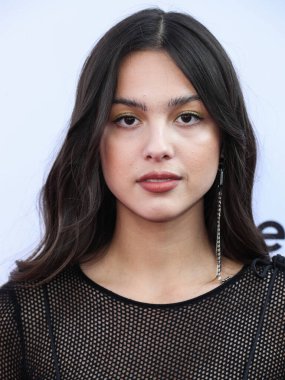 Calvin Luo 'yu giyen şarkıcı Olivia Rodrigo, Peacock ve Girls5eva tarafından sunulan ve 4 Aralık 2021' de Los Angeles, Kaliforniya 'daki City Market Social House' da düzenlenen IHG Otelleri ve Resorts sponsorluğundaki Music Hitmakers Brunch 'a geldi.