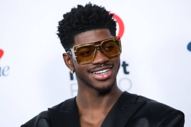 Lil Nas X iHeartRadio 102.7 KIIS FM 'in Jingle Ball 2021' e 3 Aralık 2021 'de Inglewood, Los Angeles, Kaliforniya' da düzenlenen Forum 'da ulaştı.. 