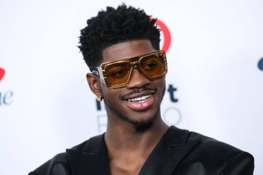 Lil Nas X arrives at iHeartRadio 102.7 KIIS FM's Jingle Ball 2021 Presented By Capital One held at The Forum on December 3, 2021 in Inglewood, Los Angeles, California, United States.  clipart
