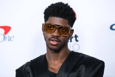 Lil Nas X iHeartRadio 102.7 KIIS FM 'in Jingle Ball 2021' e 3 Aralık 2021 'de Inglewood, Los Angeles, Kaliforniya' da düzenlenen Forum 'da ulaştı.. 