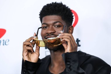 Lil Nas X iHeartRadio 102.7 KIIS FM 'in Jingle Ball 2021' e 3 Aralık 2021 'de Inglewood, Los Angeles, Kaliforniya' da düzenlenen Forum 'da ulaştı.. 