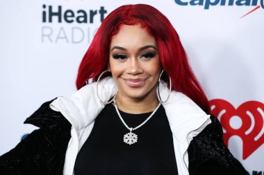 Saweetie arrives at iHeartRadio 102.7 KIIS FM's Jingle Ball 2021 Presented By Capital One held at The Forum on December 3, 2021 in Inglewood, Los Angeles, California, United States. 