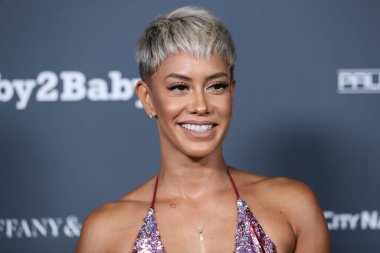 Sibley Scoles, 13 Kasım 2021 'de Batı Hollywood, Los Angeles, Kaliforniya, ABD' deki Pacific Design Center 'da düzenlenen Baby2Baby 10 yıllık galasına ulaşır.. 