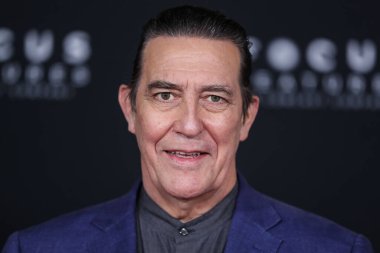 Actor Ciaran Hinds arrives at the Los Angeles Premiere Of Focus Features' 'Belfast' held at the Academy Museum of Motion Pictures on November 8, 2021 in Los Angeles, California, United States.  clipart