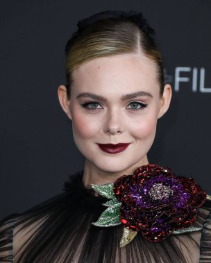 Actress Elle Fanning wearing a dress by Gucci arrives at the 10th Annual LACMA Art + Film Gala 2021 held at the Los Angeles County Museum of Art on November 6, 2021 in Los Angeles, California, United States. 
