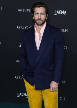 Actor Jake Gyllenhaal wearing an outfit by Gucci arrives at the 10th Annual LACMA Art + Film Gala 2021 held at the Los Angeles County Museum of Art on November 6, 2021 in Los Angeles, California, United States