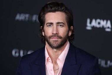 Actor Jake Gyllenhaal wearing an outfit by Gucci arrives at the 10th Annual LACMA Art + Film Gala 2021 held at the Los Angeles County Museum of Art on November 6, 2021 in Los Angeles, California, United States