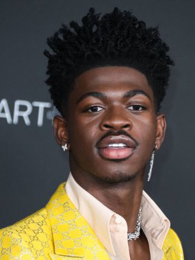 Gucci 'nin takım elbisesini giyen rapçi Lil Nas X, 6 Kasım 2021' de Los Angeles İlçe Sanat Müzesi 'nde düzenlenen 10. Geleneksel LACMA Sanat + Film Galasına geldi.. 