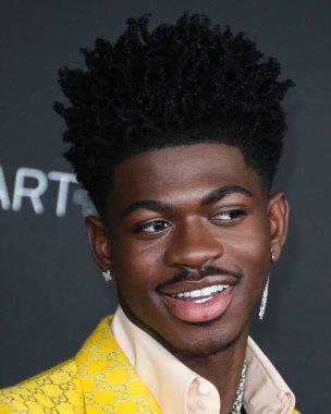 Gucci 'nin takım elbisesini giyen rapçi Lil Nas X, 6 Kasım 2021' de Los Angeles İlçe Sanat Müzesi 'nde düzenlenen 10. Geleneksel LACMA Sanat + Film Galasına geldi.. 