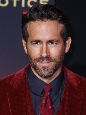 Actor Ryan Reynolds arrives at the World Premiere Of Netflix's 'Red Notice' held at the Xbox Plaza and Chick Hearn Court at L.A. Live on November 4, 2021 in Los Angeles, California, United States. clipart