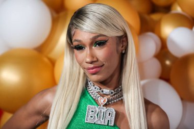Rapper BIA (Bianca Miquela Landrau) arrives at Darren Dzienciol's CARN*EVIL Halloween Party Presented by Decada and Hosted by Alessandra Ambrosio with Live performances by Doja Cat and BIA Powered by Geojam and Butter Bun on October 30, 2021 clipart