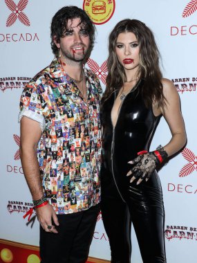 Aktör Ryan Rottman ve Shelby Bay Darren Dzienciol 'un CARN' ına geldiler * EVIL Halloween Party Decada tarafından sunuldu ve Alessandra Ambrosio 'nun sunduğu canlı performanslarla Doja Cat ve BIA Powered by Geojam and Butter Bun 30 Ekim 2021 