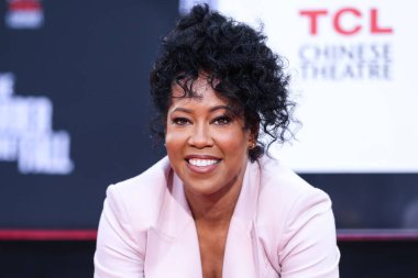 Aktris Regina King, 28 Ekim 2021 'de Hollywood, Los Angeles, Kaliforniya, ABD' deki TCL Çin Tiyatrosu IMAX Forecourt 'ta düzenlenen El İzleri ve Ayak İzleri Töreni' ne katıldı.. 