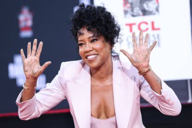 Aktris Regina King, 28 Ekim 2021 'de Hollywood, Los Angeles, Kaliforniya, ABD' deki TCL Çin Tiyatrosu IMAX Forecourt 'ta düzenlenen El İzleri ve Ayak İzleri Töreni' ne katıldı.. 