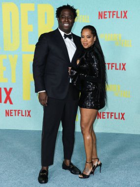 Yönetmen Jeymes Samuel ve aktris Regina King, 13 Ekim 2021 'de Los Angeles, Kaliforniya, ABD' de bulunan Shrine Auditorium ve Expo Hall 'da düzenlenen Netflix' in 