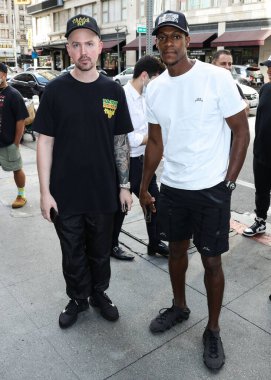 Tacos AF Eş Sahibi Brandon Thompson ve Amerikalı profesyonel basketbolcu Rajon Rondo, Los Angeles Lakers Star Rajon Rondo ile 4 Ekim 2021 tarihinde Los Angeles, Kaliforniya, ABD 'de Tacos AF' de düzenlenen Ulusal Taco Günü 'ne katıldılar..