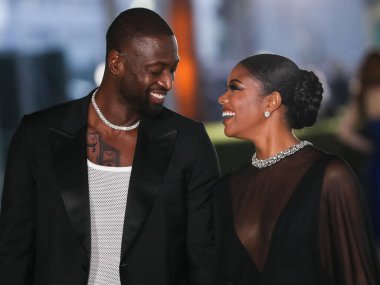 Former professional basketball player Dwyane Wade and wife/actress Gabrielle Union arrives at the Academy Museum of Motion Pictures Opening Gala held at the Academy Museum of Motion Pictures on September 25, 2021 in Los Angeles, USA