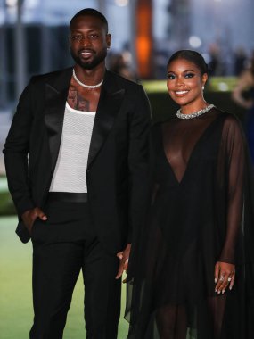 Former professional basketball player Dwyane Wade and wife/actress Gabrielle Union arrives at the Academy Museum of Motion Pictures Opening Gala held at the Academy Museum of Motion Pictures on September 25, 2021 in Los Angeles, USA