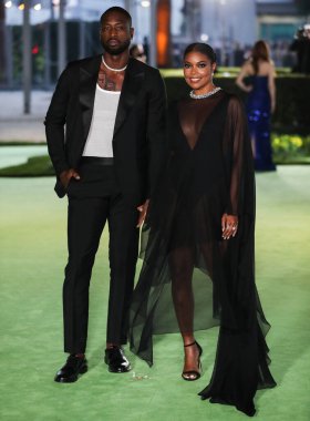 Eski profesyonel basketbol oyuncusu Dwyane Wade ve eşi / aktris Gabrielle Union, 25 Eylül 2021 'de ABD' nin Los Angeles kentinde bulunan Akademi Film Müzesi 'nin açılış galasına geldiler.