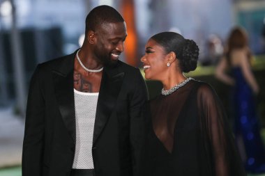 Eski profesyonel basketbol oyuncusu Dwyane Wade ve eşi / aktris Gabrielle Union, 25 Eylül 2021 'de ABD' nin Los Angeles kentinde bulunan Akademi Film Müzesi 'nin açılış galasına geldiler.
