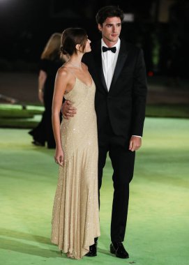 Celine elbisesi giyen Model Kaia Gerber ve Tiffany & Co. mücevher ve Celine takım elbiseli erkek arkadaşı Jacob Elordi, 25 Eylül 2021 'de Akademi Sinema Filmleri Müzesi' nin açılış galasına geldi.