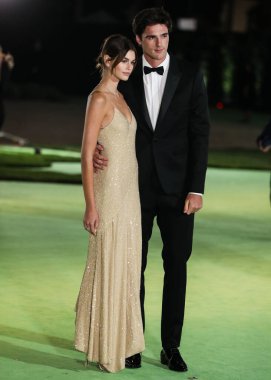 Model Kaia Gerber wearing a Celine dress and boyfriend Jacob Elordi arrive at the Academy Museum of Motion Pictures Opening Gala held at the Academy Museum of Motion Pictures on September 25, 2021 in Los Angeles, California, United States. clipart