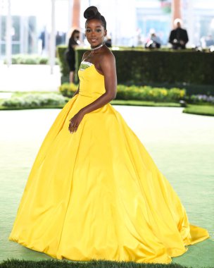 Prada giyen aktris Thuso Mbedu, 25 Eylül 2021 'de ABD' nin Kaliforniya eyaletinin Los Angeles kentinde bulunan Akademi Sinema Filmleri Müzesi 'nin açılış galasına geldi.. 