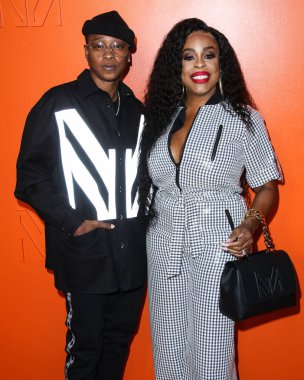 Singer Jessica Betts and wife/actress Niecy Nash arrive at the MARCELL VON BERLIN Spring/Summer 2021 Runway Fashion Show held at the SheatsGoldstein Residence on September 16, 2021 in Beverly Hills, Los Angeles, California, United States. clipart