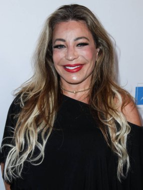 Şarkıcı / söz yazarı Taylor Dane, 20 Ağustos 2021 'de Beverly Hilton Hotel' de düzenlenen 21. Geleneksel Harold ve Carole Pompa Vakfı Galasına geldi.. 