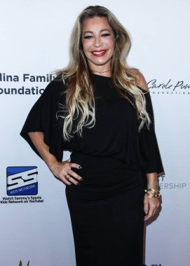 Şarkıcı / söz yazarı Taylor Dane, 20 Ağustos 2021 'de Beverly Hilton Hotel' de düzenlenen 21. Geleneksel Harold ve Carole Pompa Vakfı Galasına geldi.. 