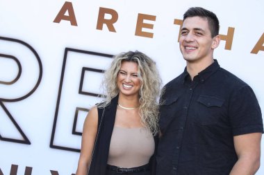 Şarkıcı Tori Kelly ve kocası Andre Murillo, 8 Ağustos 2021 'de Westwood, Los Angeles, Kaliforniya, ABD' deki Regency Village Theatre 'da düzenlenen MGM' nin 'Saygı' adlı Los Angeles galasına geldiler..
