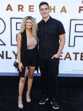 Şarkıcı Tori Kelly ve kocası Andre Murillo, 8 Ağustos 2021 'de Westwood, Los Angeles, Kaliforniya, ABD' deki Regency Village Theatre 'da düzenlenen MGM' nin 'Saygı' adlı Los Angeles galasına geldiler.. 